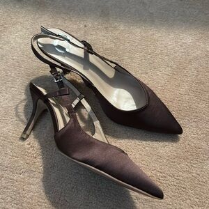 BROWN satiny slingbacks.
